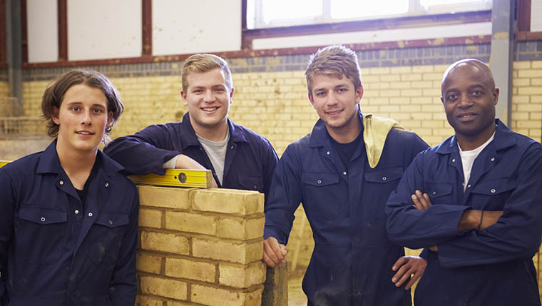 Team of construction apprentices