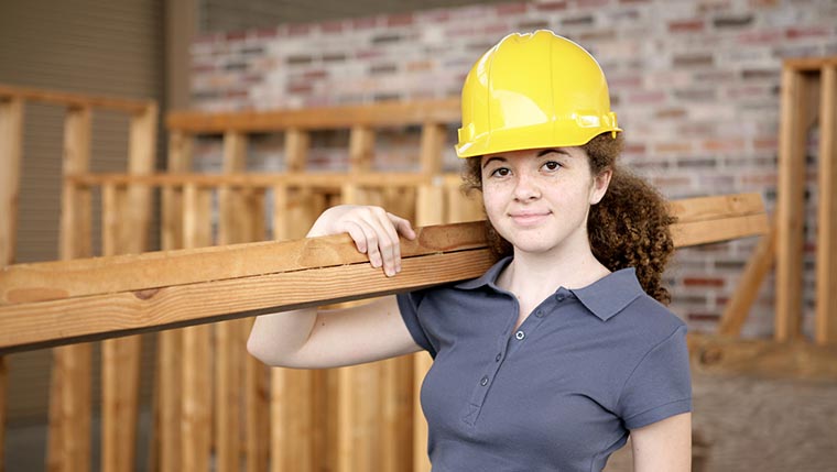 Young woman construction apprentice