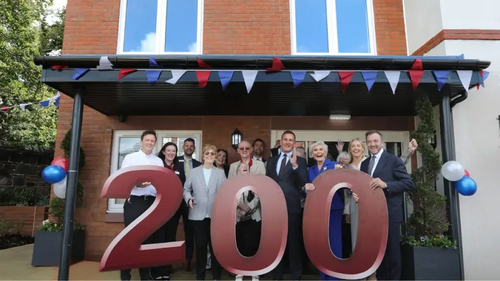 Churchill Living has marked the opening of its 200th development by welcoming Angela Rippon CBE, to Coronation Lodge in West Kirby.